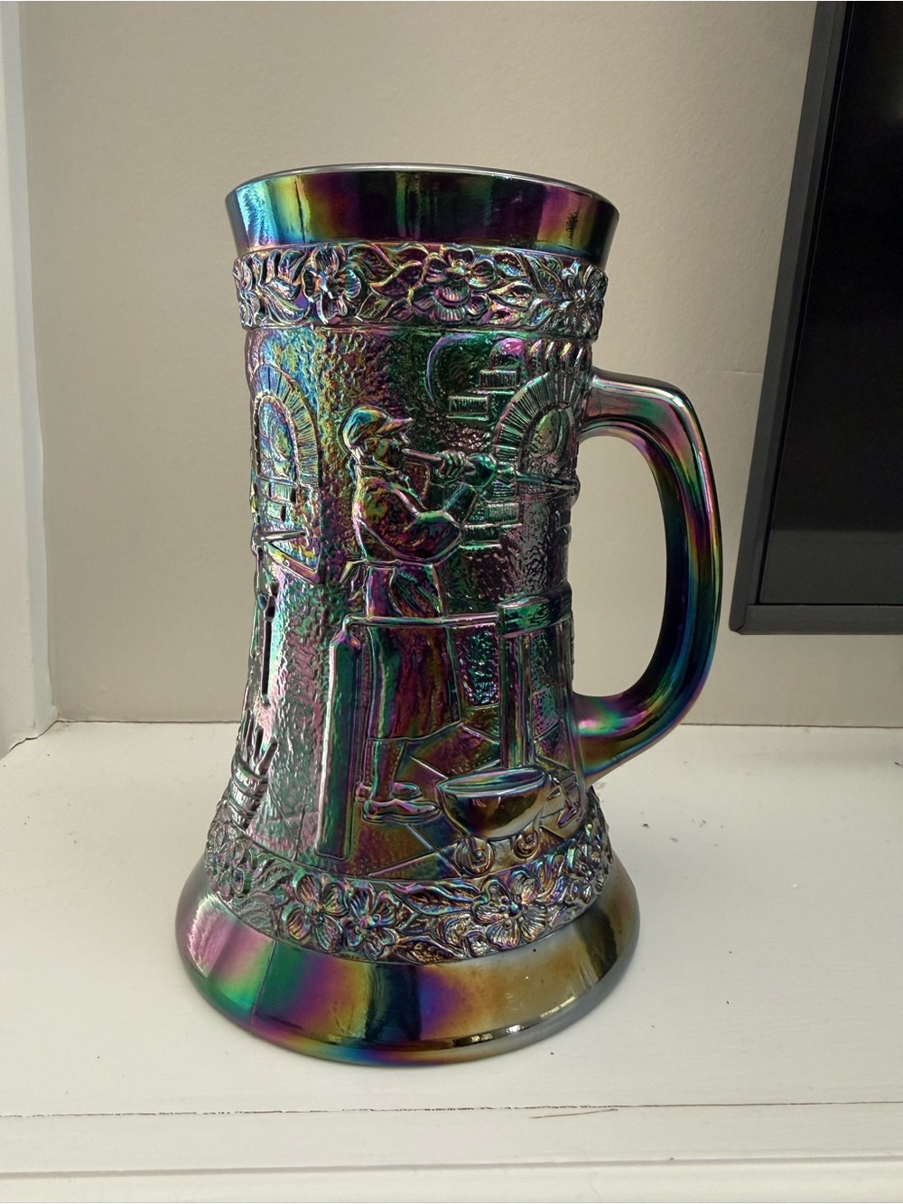 Fenton Amethyst Carnival Glass Beer Stein  the "Glass Blower Shop" pattern.